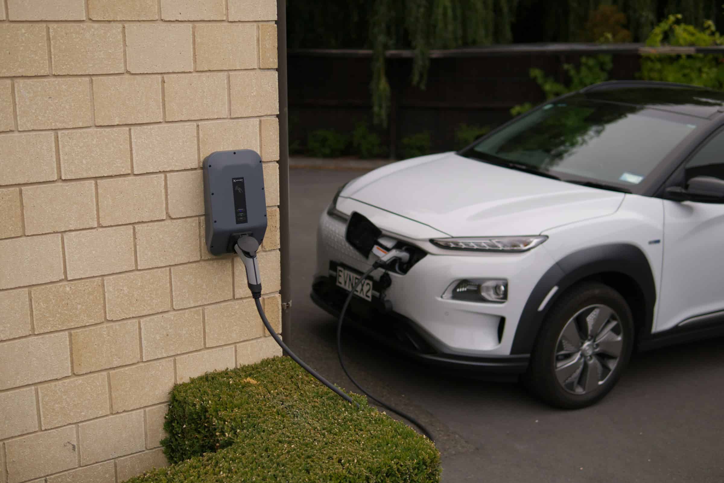 EV plugged in to a home charging station